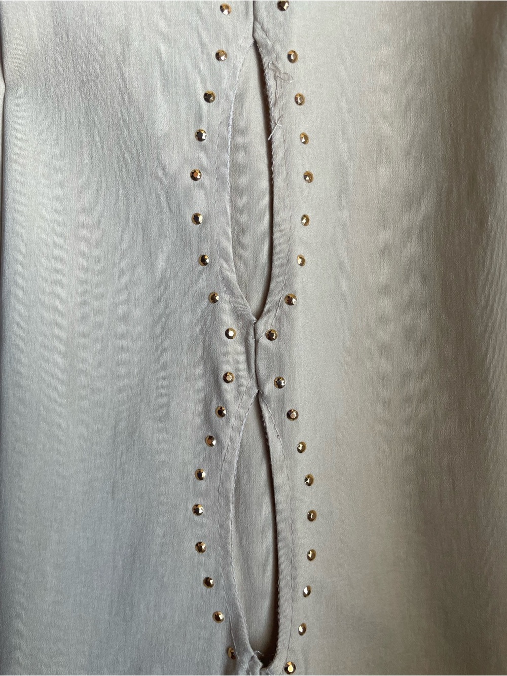 Forever 21 Cream petite bell bottom pants with Gold Stud Accents cut outs